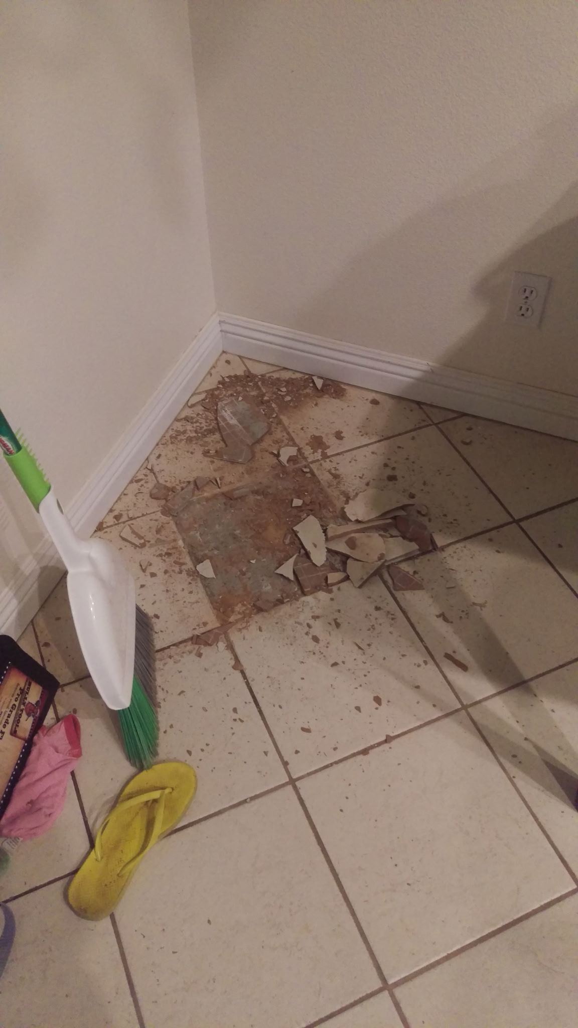 Damaged tile ready for repair